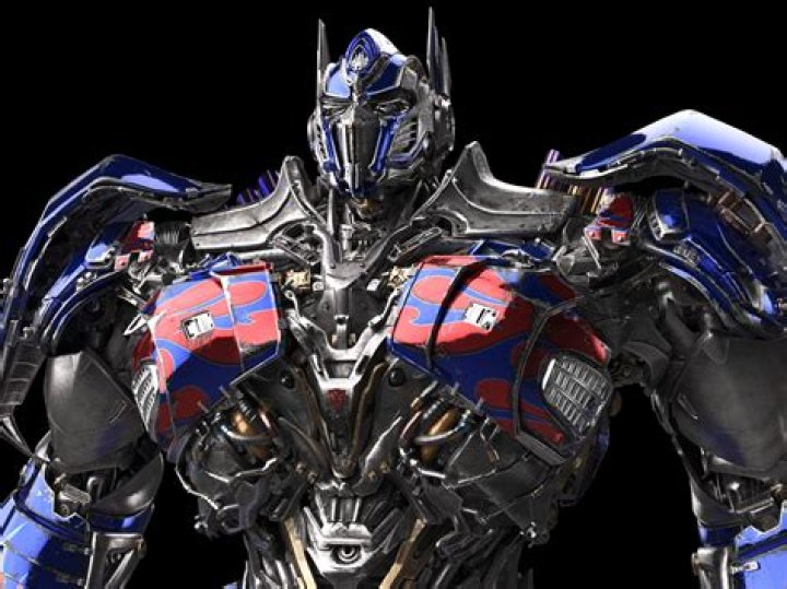 An image of Optimus Prime and the Maximals standing together in Transformers: Rise of the Beasts