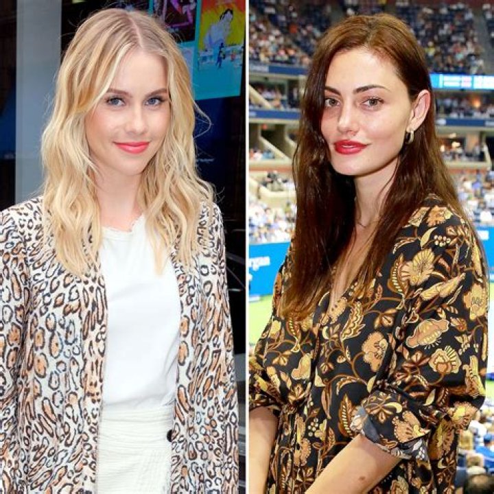Claire Holt, Phoebe Tonkin, and Cariba Heine as mermaids with their hands raised in H2O: Just Add Water