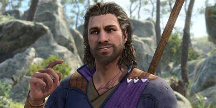 Gale of Baldur's Gate 3 looks confused as he speaks to a friend.