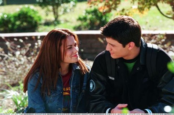 Haley and Nathan's son Jamie looking in the mirror