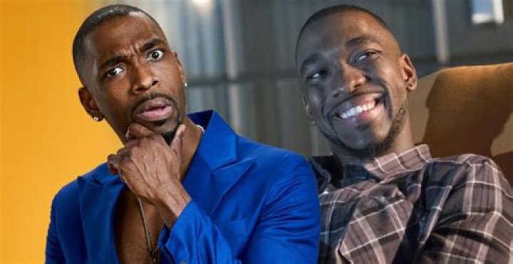 Jay Pharaoh from sitting with Colin Jost at the Weekend Update desk on Saturday Night Live.