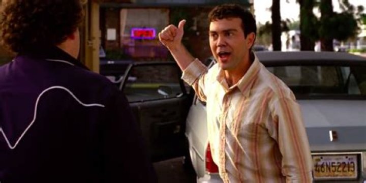 Joe Lo Truglio as Francis pointing behind him in Superbad.