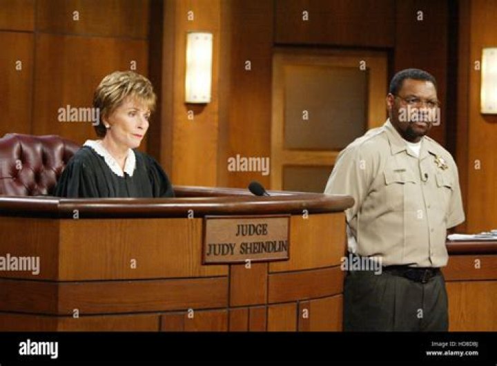 Judge Judy Bailiff Byrd smiling with Judith Sheindlin Judge Judy
