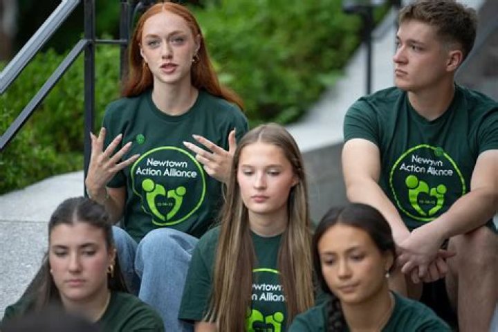 Newtown High graduates told to honor 20 classmates killed as first