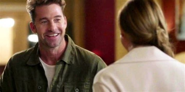 Nick smiling at Meredith on Grey's Anatomy