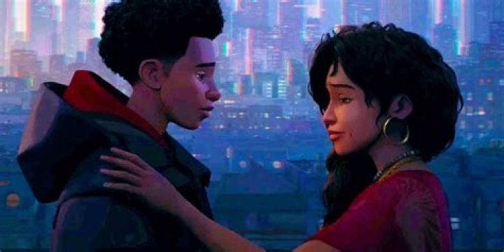 Rio Morales kisses Miles on the cheek in Spider-Man into the Spider-Verse