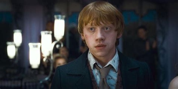Ron wears a suit at Bill's wedding in Harry Potter and the Deathly Hallows
