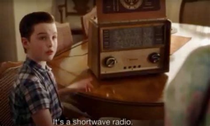 Sheldon sits by a radio at the dinner table and Sheldon sits in the cabin in Young Sheldon