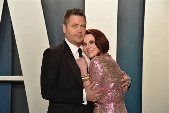 Split image of Megan Mullaly as Karen Walker in Will & Grace