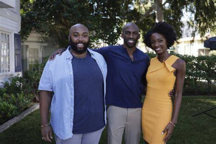 Xavier Azah and Derek smiling